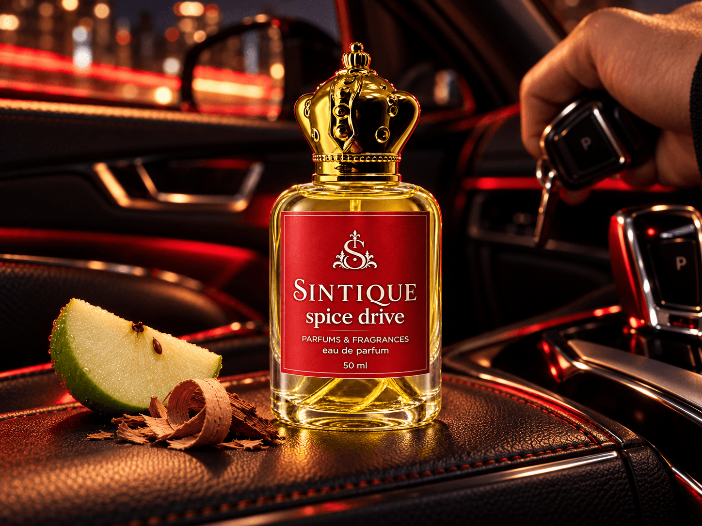 Spice Drive bottle in a red-lit car with green apple, cedar and a key